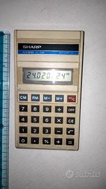Calcolatrice Sharp EL-230
anni 80
funzionante