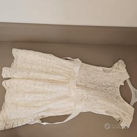 Vestito bimba in pizzo avorio con fiori applicati