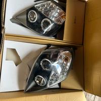 Fanali anteriori Angel Eyes neri per Citroën C2