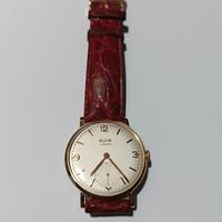 Orologio vintage in oro con cinturino in pelle