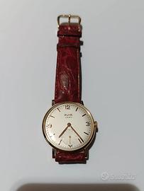 Orologio vintage in oro con cinturino in pelle