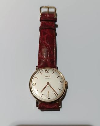 Orologio vintage in oro con cinturino in pelle