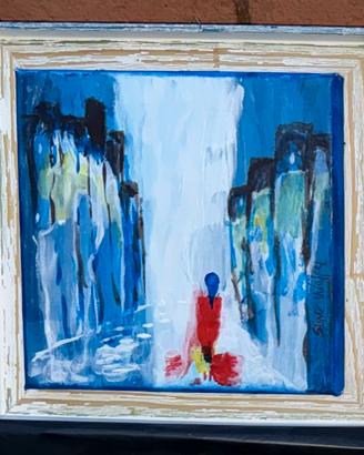 Quadro donna hai piedi della cascata