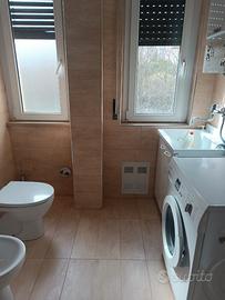 Trilocale due camere, soggiorno con angolo cottura