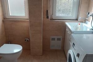 Trilocale due camere, soggiorno con angolo cottura