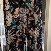 Pantaloni con motivo floreale