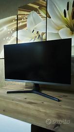 Monitor, sedia e cuffie