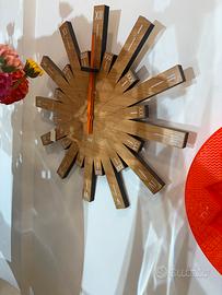 Raggiante orologio Alessi in legno di bambù