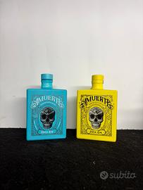Lotto 2 Bottiglie vuote di Amuerte Coca Gin