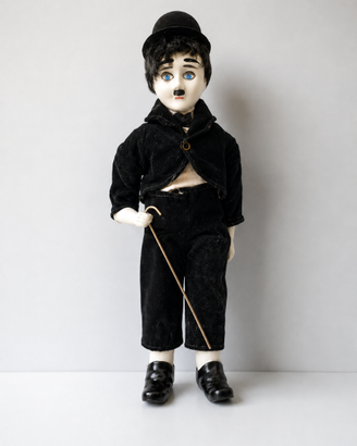 Bambola Charlie Chaplin porcellana