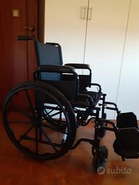 SEDIA A ROTELLE CARROZZELLA  NUOVA