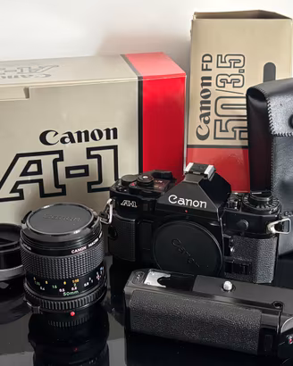 Canon A1 full kit: 50mm macro + winder A + tubo FD