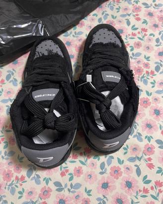 DECARBA BROKEN BLACK