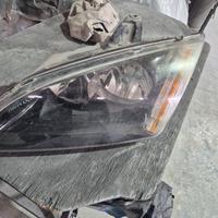 faro sinistro focus 2005 