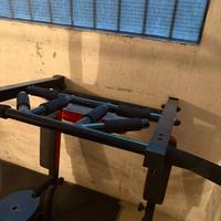 Sbarra per attrazioni e addome