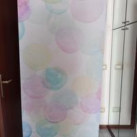 Coppia di tende a rullo.