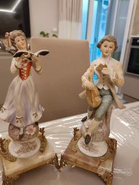 statuine musicisti
