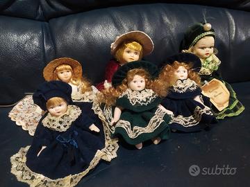 bambole in porcellana 10/15 cm