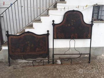 Vecchio letto in ferro battuto