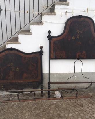 Vecchio letto in ferro battuto