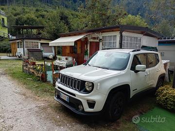 Roulotte stanziale con casetta in legno