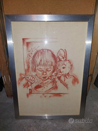 Quadro di bimba compreso di cornice argentata
