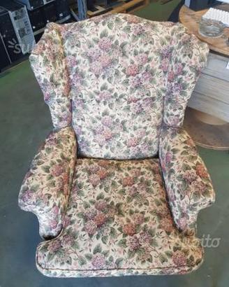 Poltrona vintage con ali poggiatesta
