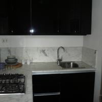 CUCINA AD ANGOLO NERA LACCATO LUCIDO