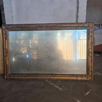 Specchio antico con cornice in legno dorato