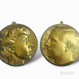 Coppia bassorilievi prima guerra Vogelaar bronzo