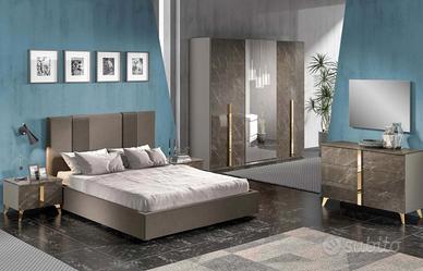 Camera da letto con letto contenitore