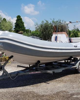 SACS 560 + EVINRUDE OCEAN PRO 90 CV + CARRELLO