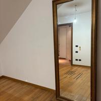 Specchio con cornice lavorazione