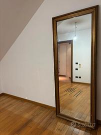 Specchio con cornice lavorazione