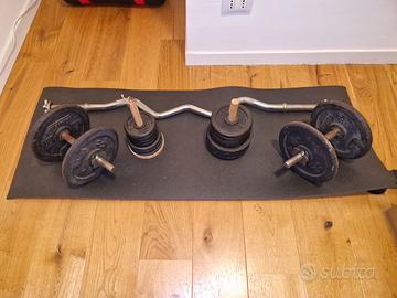 Pesi manubri e bilanciere + 44kg di pesi in ghisa