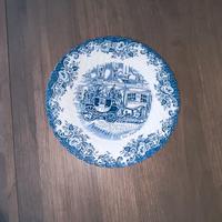 piatto raffigurante una carrozza d'epoca