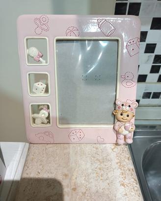 Cornice porta foto bambina neonato in ceramica 