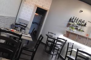 Pizzeria con tavoli asporto e domicilio