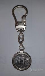 Moneta 500 lire argento, con portachiavi vintage.