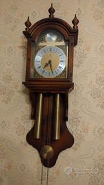 orologio a pendolo con cassa in legno 