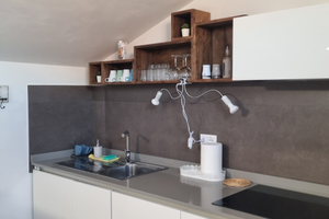 Nuovo appartamento mansardato arredato