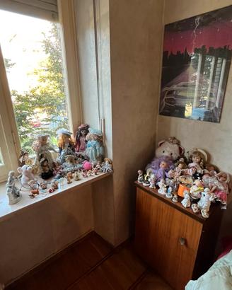 Collezione bambole in Porcellana e Giochi Vintage.