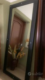 specchio nero in pelle