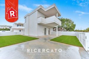 Piano terra bifamiliare con giardino di nuovo real