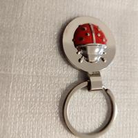 Portachiavi Coccinella in metallo  mai utilizzato.