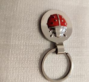 Portachiavi Coccinella in metallo  mai utilizzato.