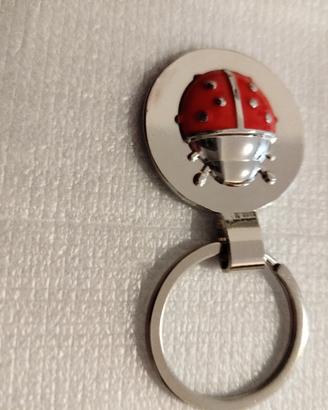 Portachiavi Coccinella in metallo  mai utilizzato.