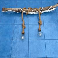 Lampadario con radici avvolte