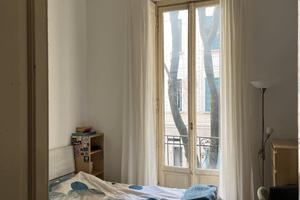 Camera matrimoniale in ampio appartamento