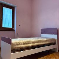 Struttura letto con rete e materasso